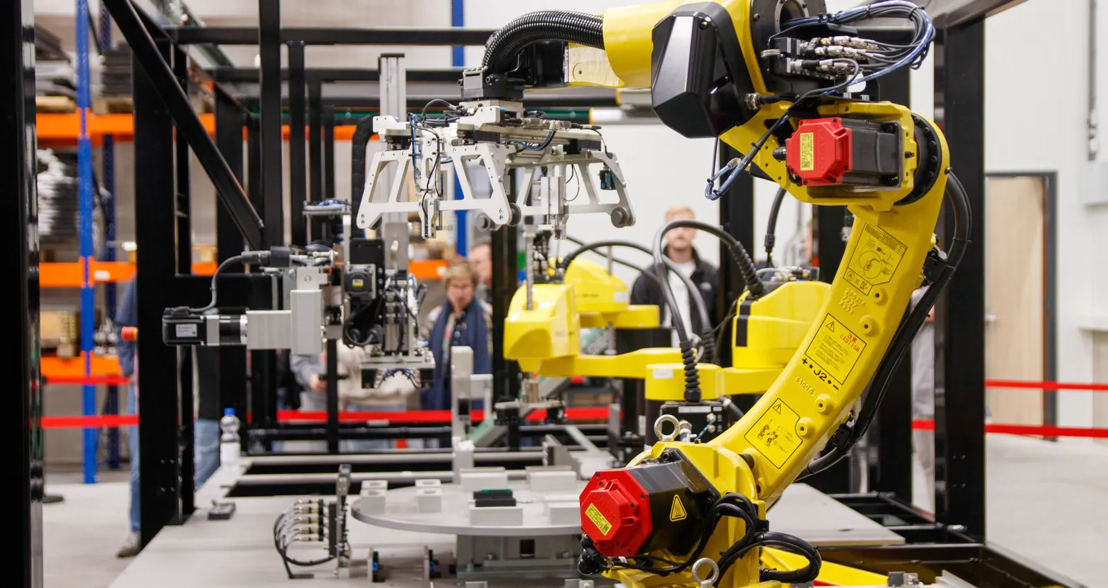 An industrial robotic arm working on an automated production cell